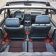 I am 187 cm tall. With the drivers seat in my position I can sit somewhat comfortably on the back seat.